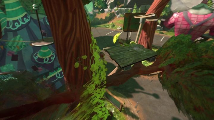 The card is on a wooden platform in front of the tent - Psychonauts 2: PSI Challenge Card, Questionable Area - where to find? - Questionable Area - Psychonauts 2 Guide
