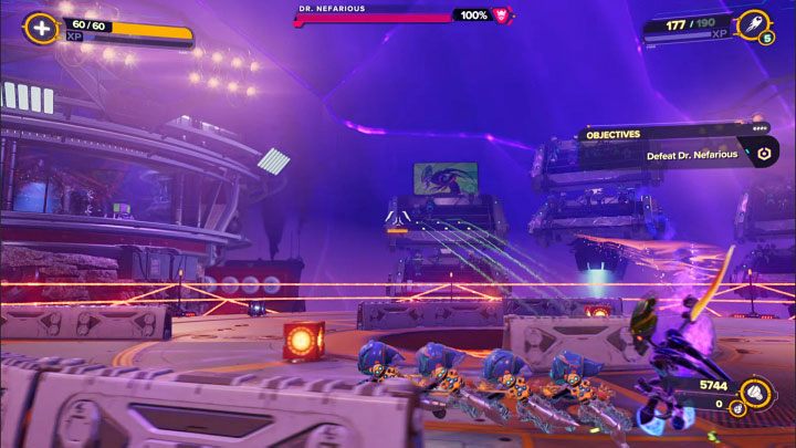 During the first phase (out of four), your task will be to get his health bar down from 100 down to 80% - Ratchet & Clank Rift Apart: Meet Ratchet in Gastropub - walkthrough - Scarst debris cloud - back - Ratchet & Clank Rift Apart Guide