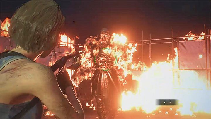 Nachdem der Treibstofftank zerstört wurde, gelangen Sie zur zweiten Phase des Kampfes – Sie müssen die brennende Nemesis angreifen und ihr ausweichen – Resident Evil 3: Komplettlösung für die Abbruchstelle – Komplettlösung für die Geschichte – Resident Evil 3-Leitfaden