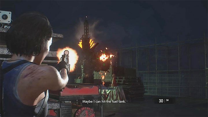 Der Schlüssel zum Sieg im ersten Teil dieser Schlacht ist das Schießen auf den Treibstofftank auf dem Rücken von Nemesis – Resident Evil 3: Nemesis – Bosskampf auf der Demolition Site – Nemesis-Bosskämpfe – Resident Evil 3 Guide
