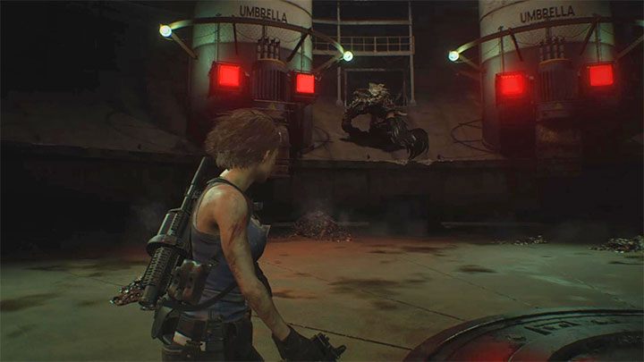 During the second phase of the fight, Nemesis will run around the edge of the arena from time to time - Resident Evil 3: Nemesis - NEST 2 boss fight - Nemesis boss fights - Resident Evil 3 Guide