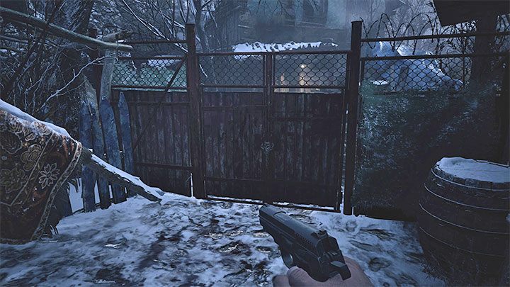 Investigate the hut again, specifically the spot where the villager was hiding - Resident Evil Village: The first battle in the village/Village Square - walkthrough - Village - 1st visit - Resident Evil Village Guide
