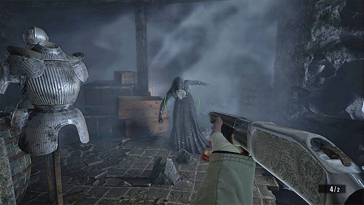 From this point on, the course of the fight will become very familiar - wait for the vampire to appear next to the demolished wall where the cold air is - Resident Evil Village: Castles Courtyard - walkthrough - Dimitrescu Castle - Resident Evil Village Guide