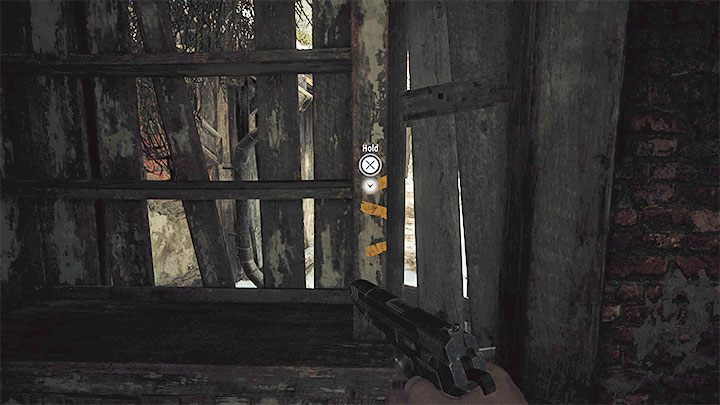 The main character has to investigate the shed and in the spot in the picture, you will need to use the interaction button to unlock further passage - Resident Evil Village: Finding the house with the red chimney - walkthrough - Village - 2nd visit - Resident Evil Village Guide