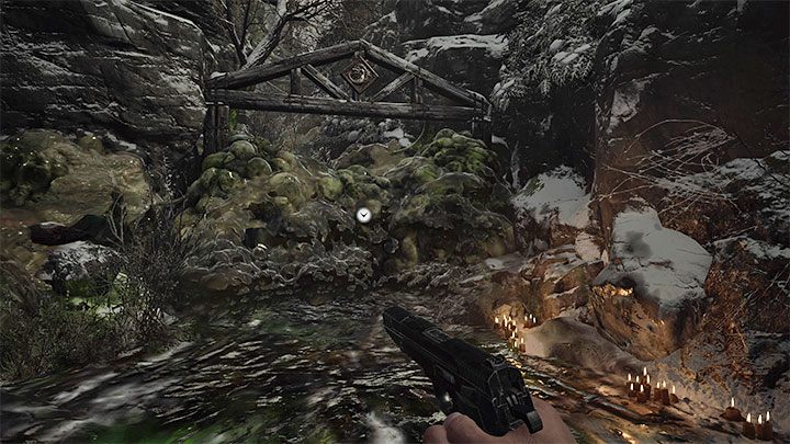 You must keep following the only possible path that runs by the river - Resident Evil Village: Going through the village to the boat - walkthrough - Fortress - Resident Evil Village Guide