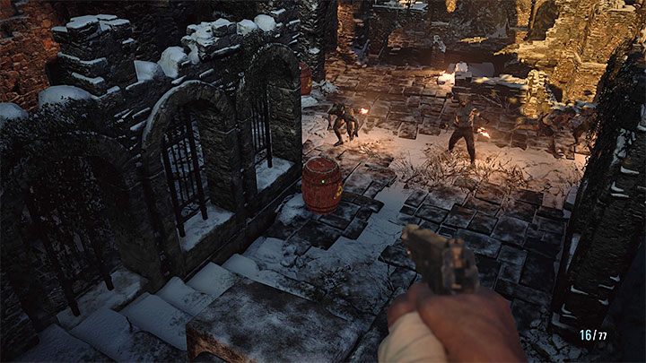 Once you reach the locked gate, use the ladder to reach the first of the two mechanisms responsible for raising it - Resident Evil Village: Going through the stronghold - walkthrough - Fortress - Resident Evil Village Guide