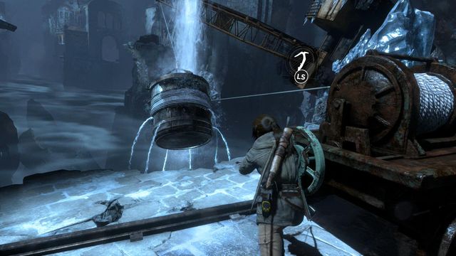 Move the cart with the hoist, more or less, halfway along the track - Rise of the Tomb Raider: Break through the door, walkthrough - Shortcut - Rise of the Tomb Raider Guide