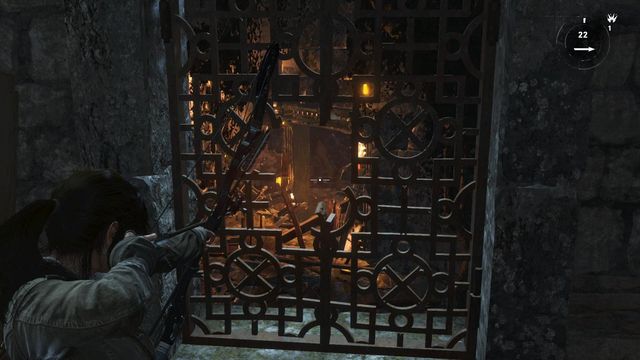 After you collect the projectiles, get back through the window with grate and aim at the blockade in front of the door - Rise of the Tomb Raider: Destroy the blockade to free the Remnants, walkthrough - To the Tower - Rise of the Tomb Raider Guide