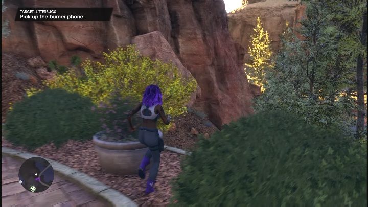 When you reach the place marked on the map, you will see a phone hidden in the bushes next to the fountain - Saints Row 2022: Litterbugs - how to complete contract? - Wanted - Saints Row Guide, Walkthrough