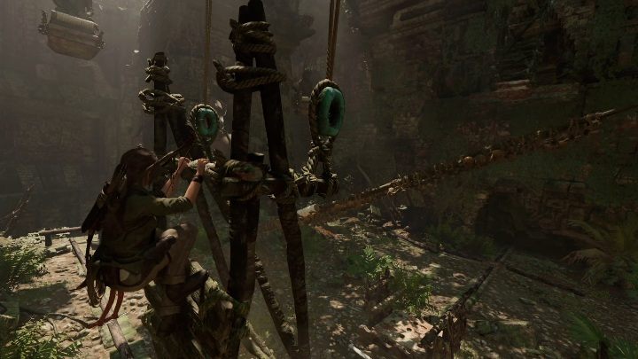 Once youre done with this part of the puzzle, climb higher and jump down on the lift - Challenge Tombs - Peruvian Jungle Tombs in Shadow of the Tomb Raider Game - Challenge Tombs - Shadow of the Tomb Raider Game Guide