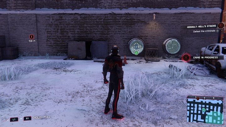 The first capsule in the center of Hell's Kitchen is located in one of the pipes at the back of the building - Spider-Man Miles Morales: Time capsules - all locations, list - Find - Spider-Man Miles Morales Guide