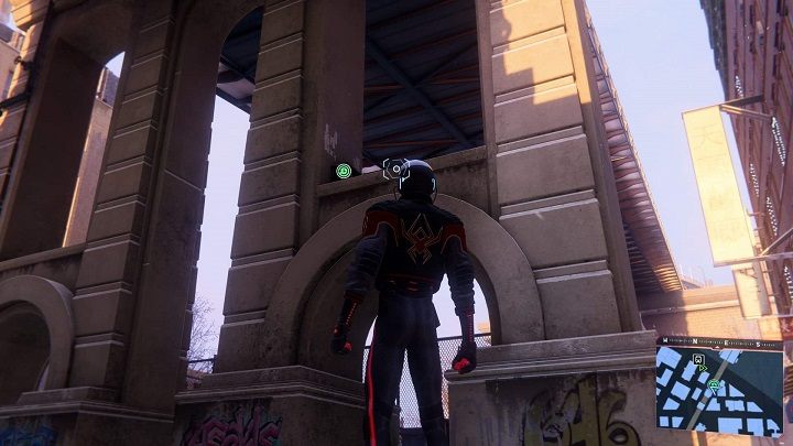 The first capsule in Chinatown is located under a bridge near the river - Spider-Man Miles Morales: Time capsules - all locations, list - Find - Spider-Man Miles Morales Guide