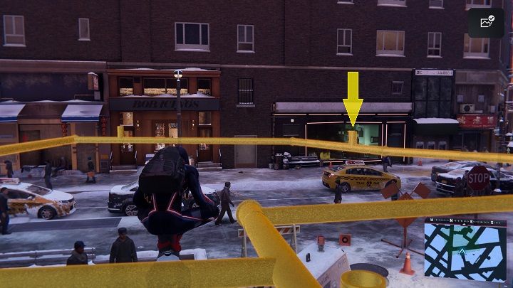 After selecting this task from the app, go to the financial district and talk to the guy in the red checkered shirt - Spider-Man Miles Morales: Activities in the FNSM App - walkthrough, list - MSMZS application - Spider-Man Miles Morales Guide
