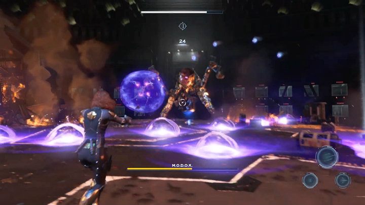 MODOK will also fire energy balls that remain on the ground for quite some time - Marvels Avengers: By Force of Mind, walkthrough - Gold Coast - Marvels Avengers Guide