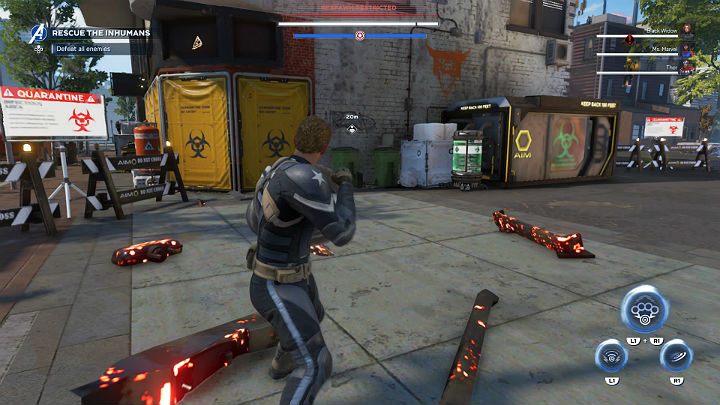 Another kidnapped Inhuman is locked in a warehouse in a building with yellow fabrics with a distinctive sign - Marvels Avengers: Mayhem over Manhattan, walkthrough - Eastern seaboard - Marvels Avengers Guide
