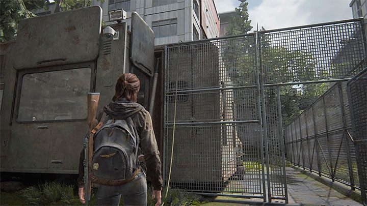 The cable must hang on the fence on the other side of the command center after the throw is made - this is shown in the picture - The Last of Us 2: The Gate - collectibles, artefacts, coins - Seattle Day 1 - Ellie - The Last of Us 2 Guide