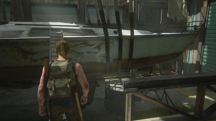 You reach the suspended boat - there is a ladder next to it, place it in such a way so that the ladder touches the boat, creating a pathway - The Last of Us 2: On Foot, Seattle Day 1 Abby walkthrough - Seattle Day 1 - Abby - The Last of Us 2 Guide