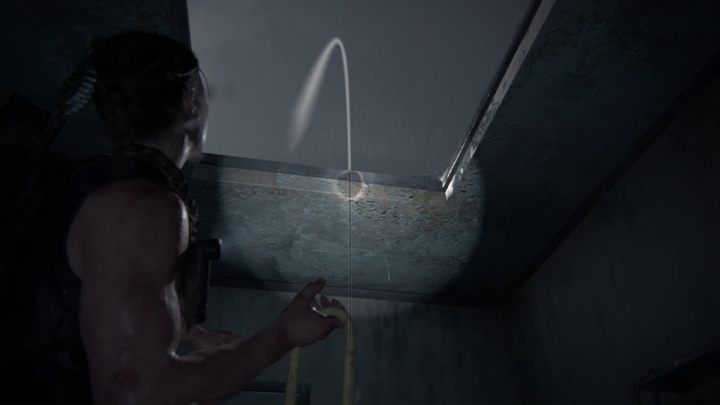 Now pick up the cable and throw it to the location shown in the picture above - The Last of Us 2: The Coast, Seattle Day 1 Abby walkthrough - Seattle Day 1 - Abby - The Last of Us 2 Guide