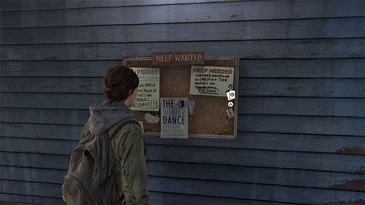 The secret is attached to one of the bulletin boards on the wall of the building with a blue elevation - The Last of Us 2: Waking Up - collectibles, artefacts, coins - Jackson - The Last of Us 2 Guide