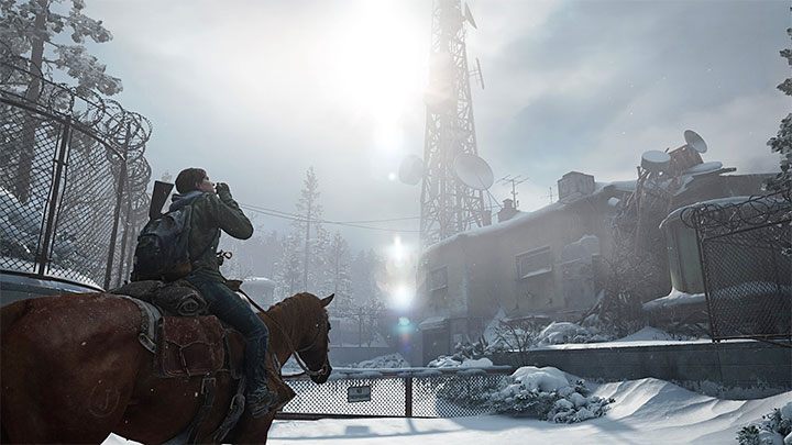 In the early part of the stage, Dina and Ellie ride their horses and arrive to the building with a large radio tower (as shown in the picture) - The Last of Us 2: Patrol - collectibles, artefacts, coins - Jackson - The Last of Us 2 Guide