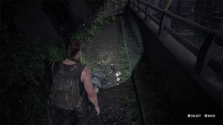 After reaching the top, turn around and reach the corpse shown in the picture and pick up the coin - The Last of Us 2: The Coast - collectibles, artefacts, coins - Seattle Day 1 - Abby - The Last of Us 2 Guide