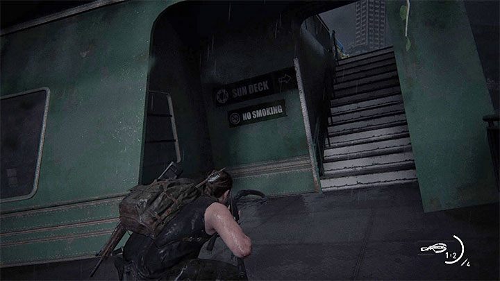 To reach this safe, you must locate the stairs shown in the image above - they lead to the top deck of the wreck - The Last of Us 2: The Coast - collectibles, artefacts, coins - Seattle Day 1 - Abby - The Last of Us 2 Guide