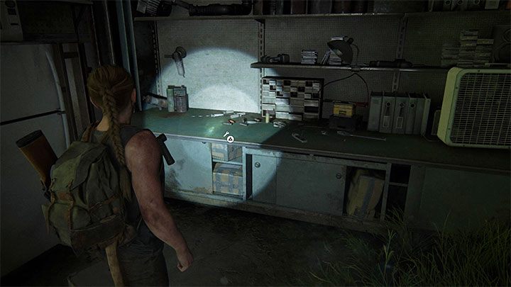 On Foot stage A workbench can be found inside the hangar, in which there is a hanging boat - The Last of Us 2: Workbenches and weapons upgrades - Character development and equipment upgrades - The Last of Us 2 Guide