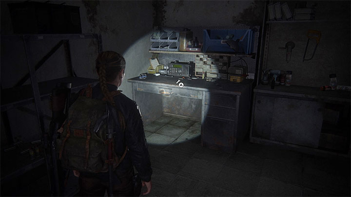 The Escape stage The workbench table is in the building to which the heroes enter through the upper shutter, just after taking part in the battle against WLF soldiers - The Last of Us 2: Workbenches and weapons upgrades - Character development and equipment upgrades - The Last of Us 2 Guide
