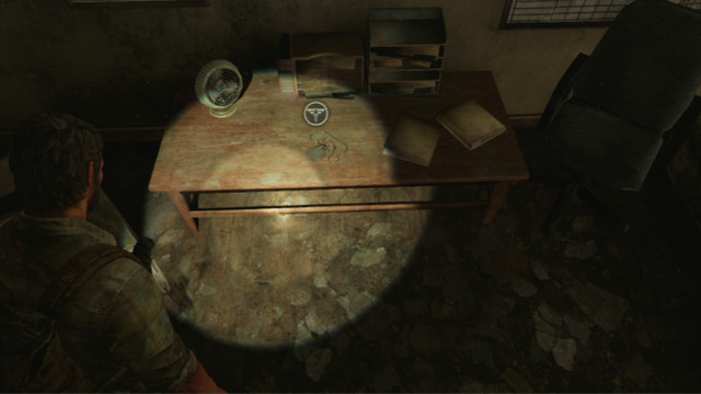 It is also a good idea to check out the adjacent room - Beyond the Wall (text & map) | The Quarantine Zone | The Last of Us Walkthrough - The Quarantine Zone - The Last of Us Guide