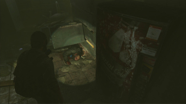 A bit further, you will bump into a man pinned down to the ground by a pile of debris - Beyond the Wall (text & map) | The Quarantine Zone | The Last of Us Walkthrough - The Quarantine Zone - The Last of Us Guide