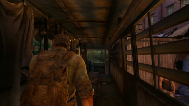 Start by turning left and keep straight ahead, until you reach the other end of the bus - The Slum (text & maps) | The Quarantine Zone | The Last of Us Walkthrough - The Quarantine Zone - The Last of Us Guide