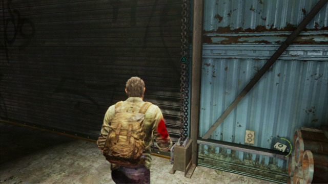 After you secure the area, approach the chain at the gate to the left and pull onto it , by pressing and holding down the triangle - The Slum (text & maps) | The Quarantine Zone | The Last of Us Walkthrough - The Quarantine Zone - The Last of Us Guide