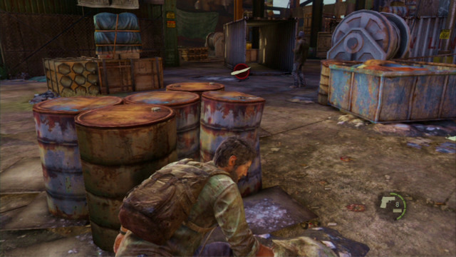 When Joel takes cover, you need to wait a bit and then, take cover behind the barrels to the right - The Slum (text & maps) | The Quarantine Zone | The Last of Us Walkthrough - The Quarantine Zone - The Last of Us Guide