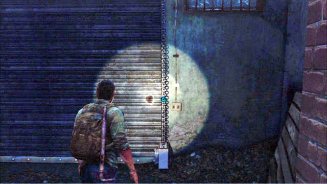 After you walk over to the other side, open the gate to the left and dash inside to avoid the approaching zombie - The Museum | The Outskirts | The Last of Us Walkthrough - The Outskirts - The Last of Us Guide