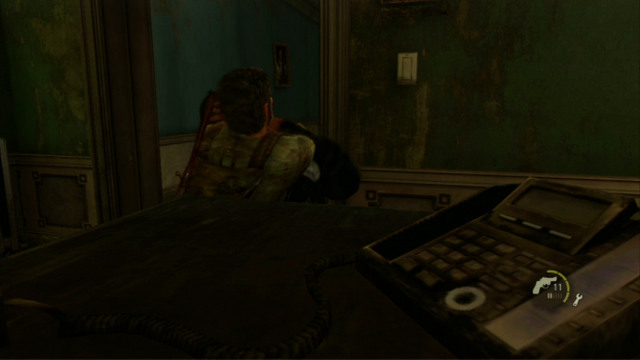 You should now hide behind the cabined in the dark room, to wait for the other one of the enemies - The Capitol Building (text & maps) | The Outskirts | The Last of Us Walkthrough - The Outskirts - The Last of Us Guide