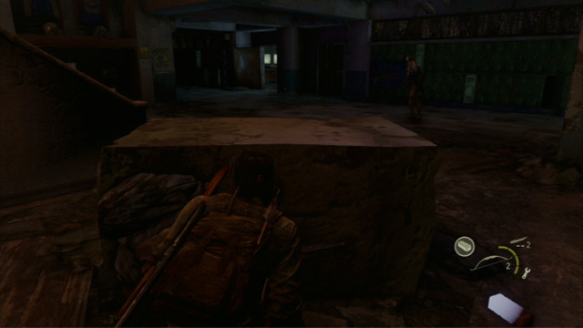 Crouch immediately inside the building and slowly make it over to the cover on the left - High School Escape (text & map) | Bills Town | The Last of Us Walkthrough - Bills Town - The Last of Us Guide