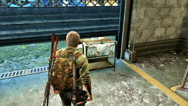 Ellie will quickly move over to the other side and block the gate with a trolley - Financial District | Pittsburgh | The Last of Us Walkthrough - Pittsburgh - The Last of Us Guide