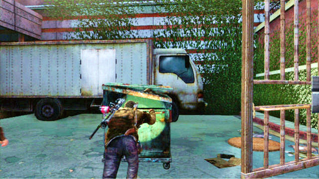With the gate opened, you need to push the container towards the truck to the right and climb onto the truck to get into the building through the hole in the wall - Go Big Horns! | The University | The Last of Us Walkthrough - The University - The Last of Us Guide