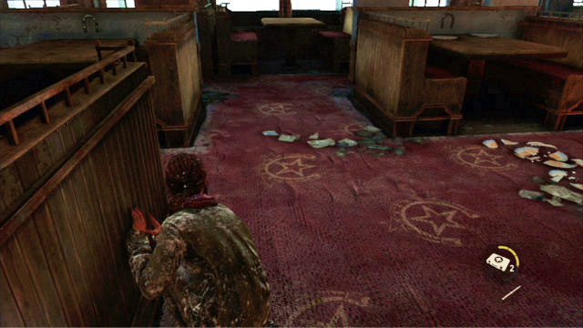 It is not difficult to sneak up to the man but, you need to watch out for the crockery fragments on the floor - Cabin Resort | Lakeside Resort | The Last of Us Walkthrough - Lakeside Resort - The Last of Us Guide