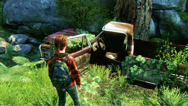 Sie sollten zwischen den Bäumen ein Autowrack bemerken, in dem sich der Comic befindet – The Last of Us: Jackson, Comics – Comics – The Last of Us Guide