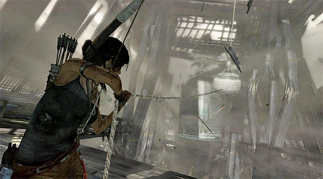 Finally, face the hanging object and shoot a rope arrow to swing it again - Find a Way Out | 11: Another Fine Mess Walkthrough - 11: Another Fine Mess | Walkthrough - Tomb Raider Game Guide
