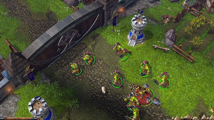 Das Tor versperrt den Weg zur Stadt – befehlen Sie Ihren Soldaten, das Tor anzugreifen, damit es nach einer Weile zerstört wird.  - Abflüge |  Komplettlösung für Warcraft III Reforged – Prolog – Leitfaden für Warcraft III Reforged